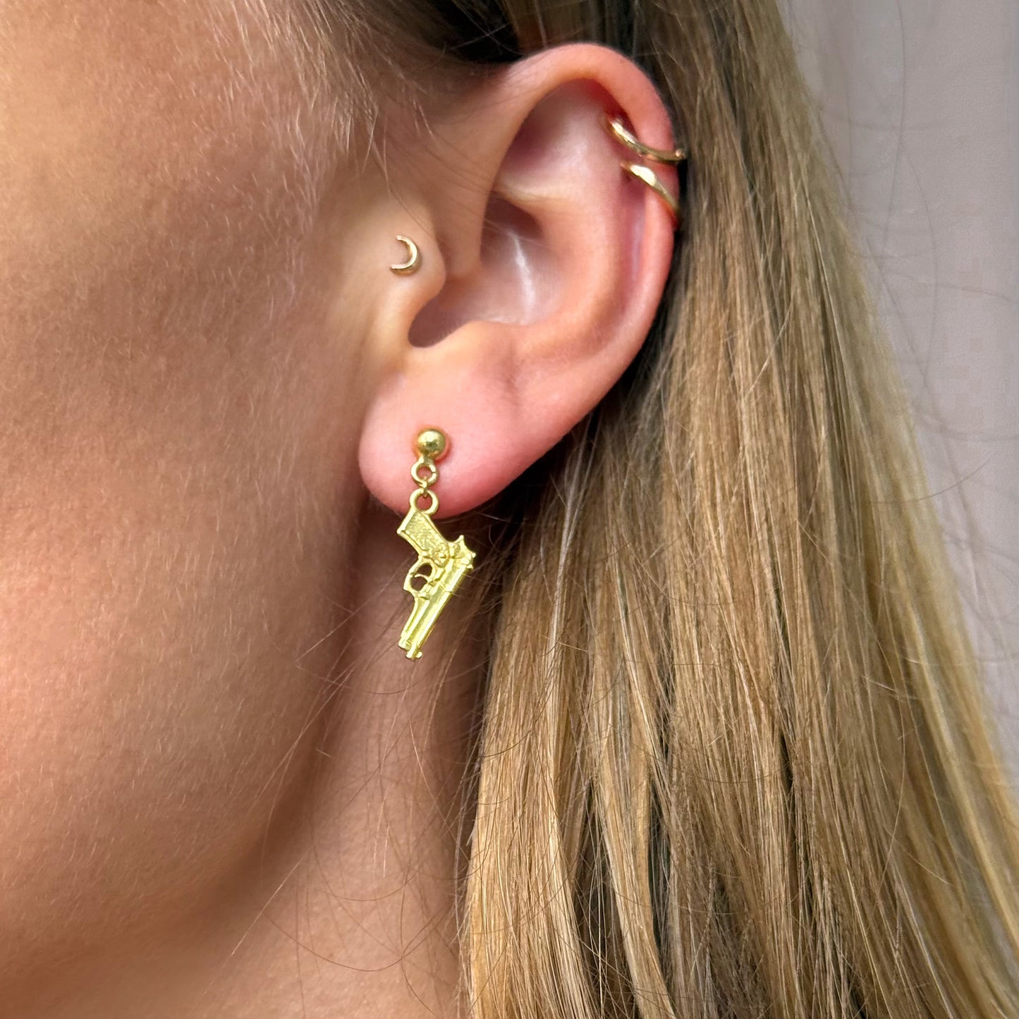 Golden Pistol Earrings – Bold & Unapologetic
