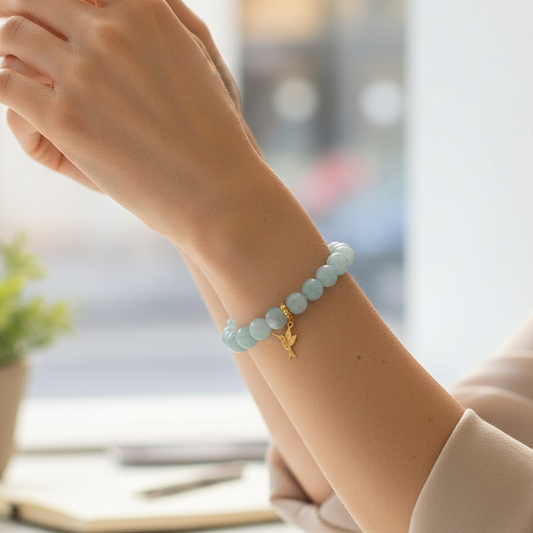 Aquamarine bracelet with Gold Hummingbird Charm